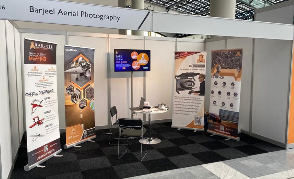 Overview of the GEO company's trade show booth at the Geospatial World Forum conference.